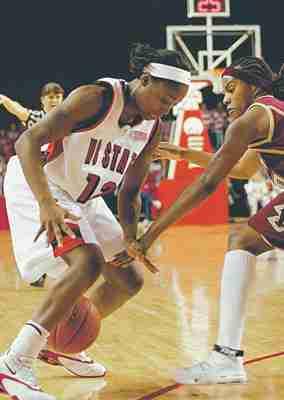 Marquetta Dickens fights for the ball against Boston College