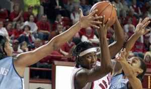 Tiffany Stansbury fights through traffic on her way to the hoop in State's 65-53 loss to UNC.