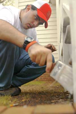 During Servive Raleigh, John Mcguire, a sophomore in metereology paints stairs at Mordecai Park. Mcguire signed up for Service Raleigh with the meterology club who were all assigned to Mordecai Park.