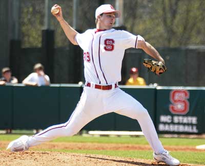 Redshirt senior Eryk McConnell launches the ball toward home plate. The team defeated Virginia