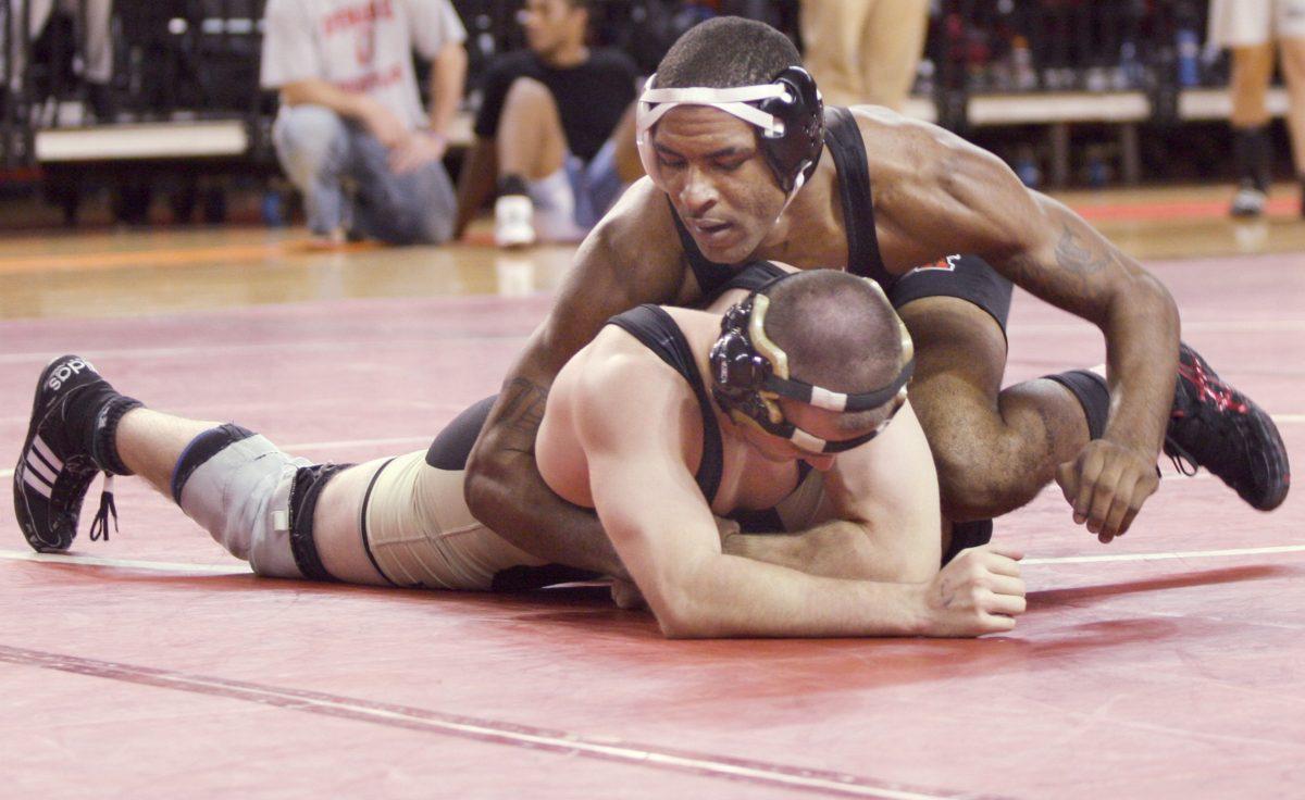 Darrion Caldwell wrestles an opponent during the Wolfpack Invitational Nov. 8.