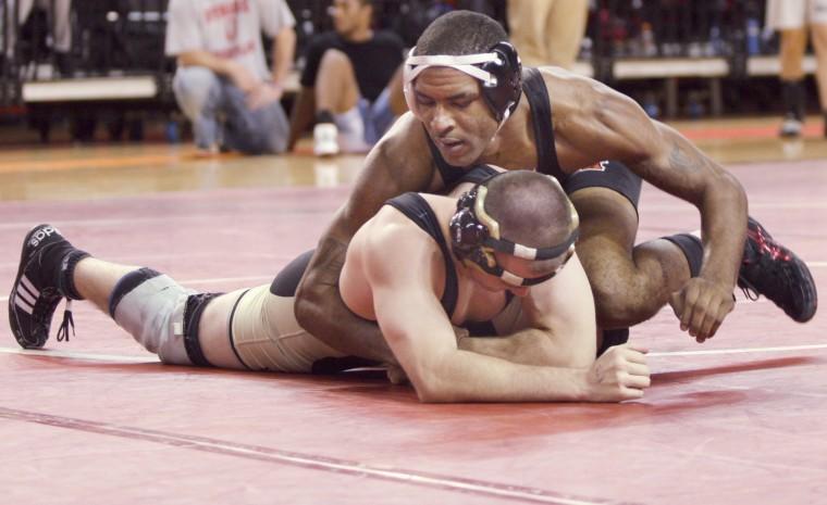 Darrion Caldwell wrestles an opponent during the Wolfpack Invitational Nov. 8.