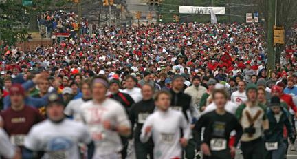 The 3,000 participants of the 2008 Krispy Kreme Challenge leave the starting line. Photo by Chris Sanchez