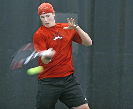 Jay Weinacker returns the ball during his singles match against Aleksandr Seleznev from Old Dominion. Weinacker won his singles match as well as his doubles match with teammate Jaime Pulgar. The Wolfpack won 4-3. Photo by David Mabe