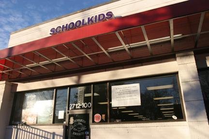 The front window of Schoolkids Records has a sign announcing that it will move. Schoolkids is planning to move from its current location near Gumby's to another location near Buddha's Belly on Hillsborough Street for a smaller store size. Photo by David Mabe