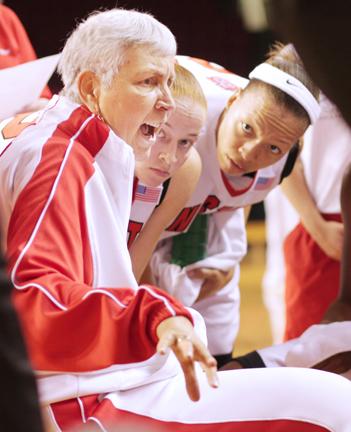 Kay Yow talks to her players during an exhibition game against the Premier Players earlier this season. Sunday the team and community will honor the late Coach Yow at the annual Hoops for Hope game.