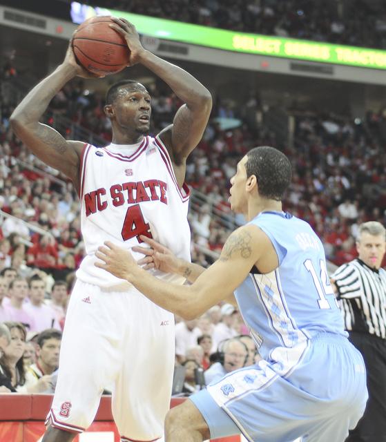 Courtney Fells looks to pass the ball during the 93-76 loss to UNC-Chapel Hill Jan. 31.