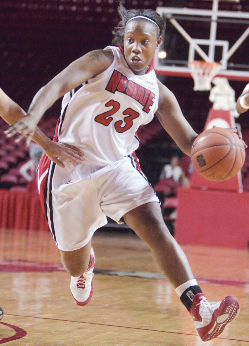 Shayla Fields, a senior guard, drives down the court during an exhibition game in Reynolds Coliseum earlier this season. Fields is the only senior on this year's roster and played in her final home game last night.