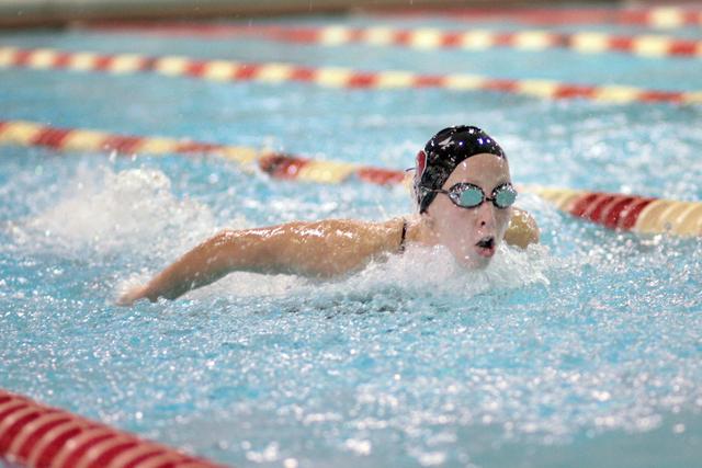 Junior swimmer Anna Linkenauger competes in the 200-yard butterfly during the Oct. 3 Red and White scrimmage in the Casey Natatorium.