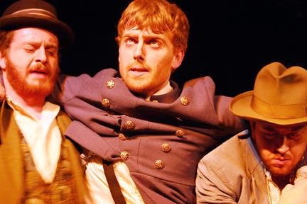Scott Heath, a senior in computer and electrical engineering and Curt Kirkhoff, a lifelong education student, support David Hook, a senior in material science and engineering, during the dress rehearsal for "Waiting for Godot." The show opens tonight at 8 p.m.
