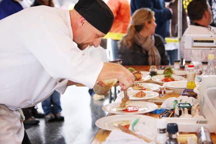 Chef John Lawther stages his plates during round one of the competition. Photo by David Mabe