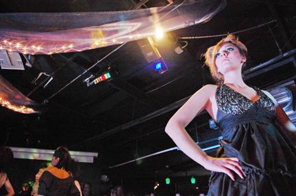 A model strikes a pose on the Redress Raleigh runway. Photo by Christin Hardy