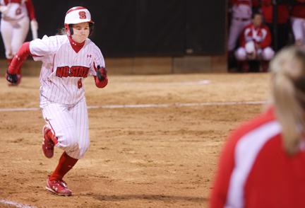 Catcher Alyssa Allbritten runs to first base after hitting the ball in the game against Siena Feb. 25. The softball team beat Fordham 6-4 on Thursday to bring their recored to 11-9. Allbritten had one hit and an RBI in the game.