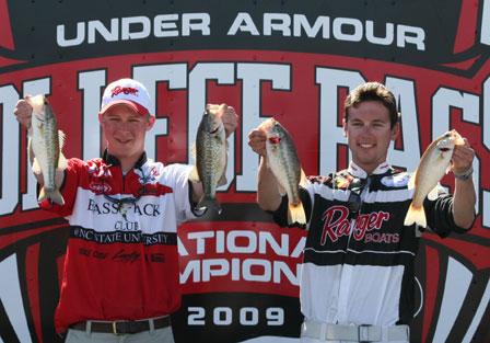 Mark Kozaznki (right) and teammate Josh Hooks (left) hold up their catch at the College Bass Eastern Super Regional in Augusta, Fla on March 8.
