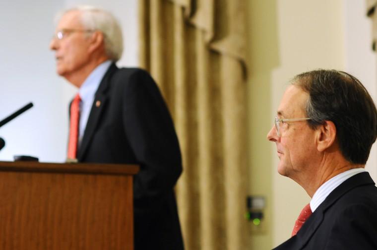 UNC President Erskine Bowles looks on as Board of Trustee Chairman Bob Woodward answers questions shortly after the BOT voted to terminate Mary Easley's contract.