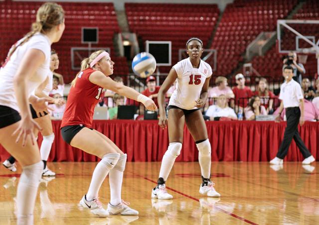 Freshman libero Kelly Wood stoops for the ball during an Oct. 14, 2008 game against UNC in Reynolds Coliseum. Wood was switched back to outside hitter after injuries struck the Pack early. Photo by Chris Sanchez