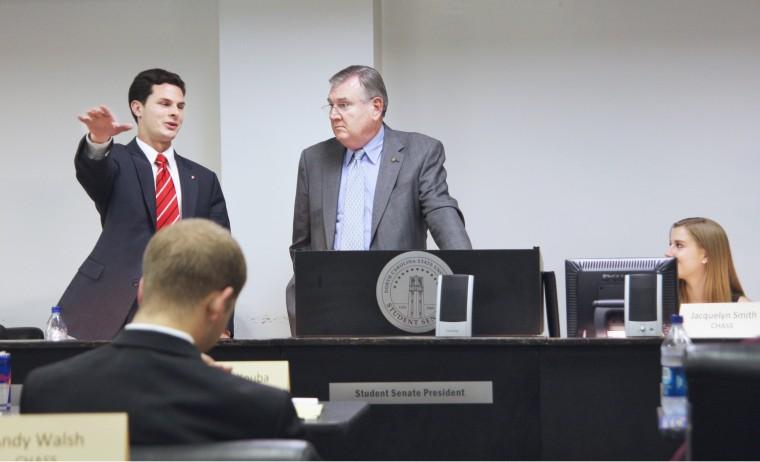 Student Body President Jim Ceresnak asks a question during a question and answer session with Tony Rand, majority leader of the N.C. Senate, in the student senate chambers in Witherspoon Wednesday. During the meeting Rand spoke about issues including sustainability, education expenses and health care. Photo by David Mabe