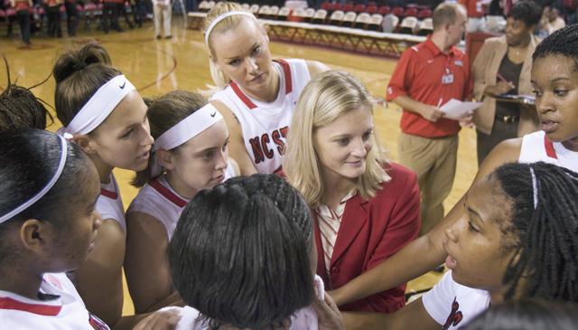 Head coach Kellie Harper brings in the huddle after the women's basketball scrimmage vs. North Greenville Monday, Nov. 2 in Reynolds Colosseum. The Wolfpack defeated North Greenville 87-44. Photo by Dreier Carr