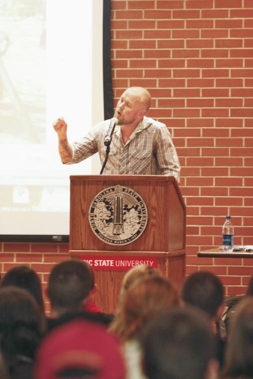 Doc Hendley, Class of 2004, speaks in front of students in the Talley Student Center Ballroom, Wednesday, as part of the week long homecoming celebration. "There is nothing special about me whatsoever - I'm just a regular, average, person." Said Hendley, the founder of Wine to Water, a "non-profit aid organization focused on providing clean water to needy people around the world." His speech focused on how ordinary people can make extraordinary changes. "I didn't think any of my experiences in