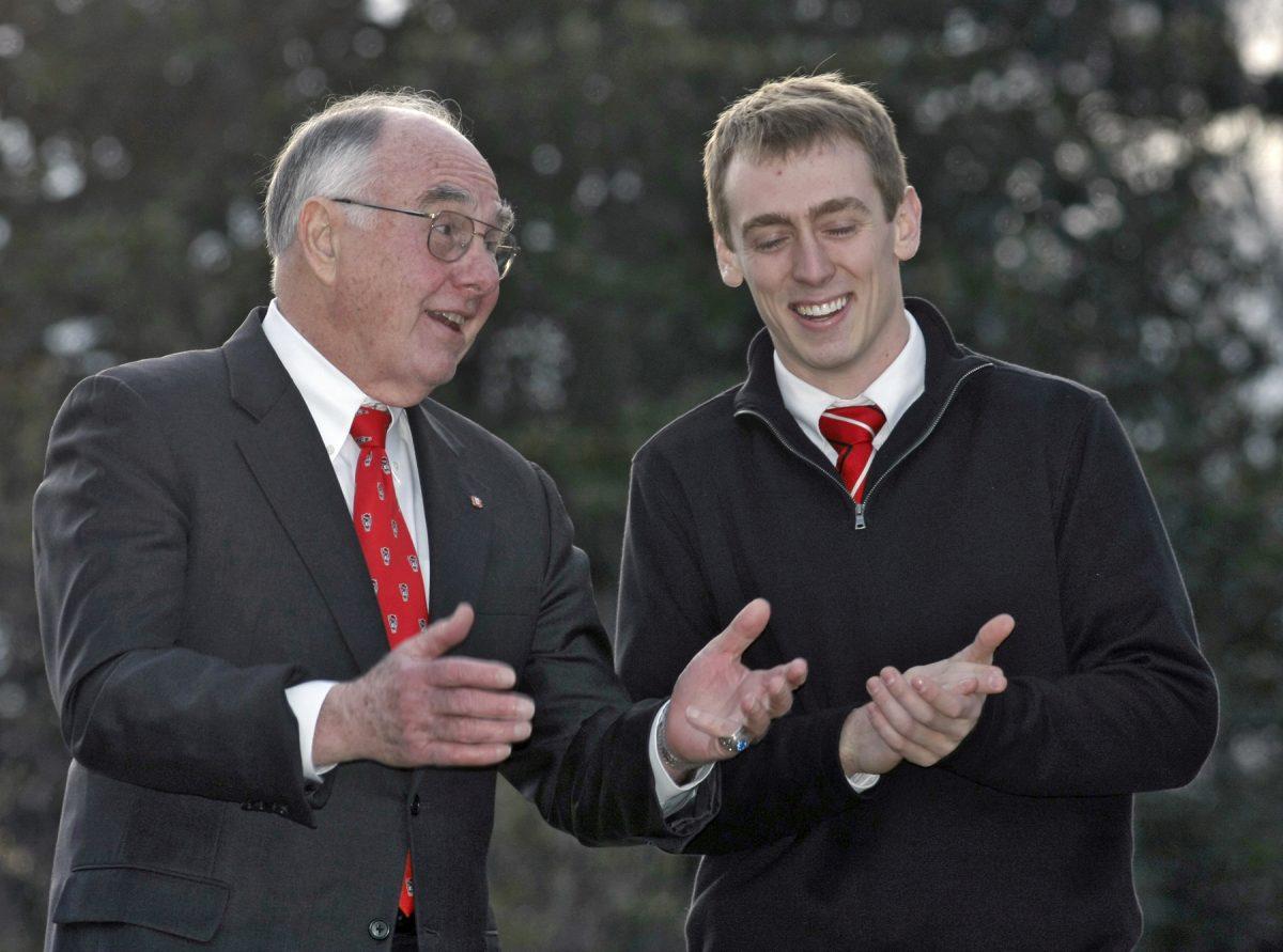 senior Class president Jay dawkins and Chancellor James Woodward converse after speaking at the senior class gift spring kickoff at the Bell Tower Thursday. Photo by Tim O'Brien