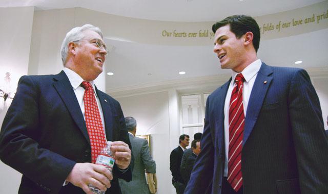 William "Randy" Woodson, officially accepted Friday by the UNC Board of Governors to be the next chancellor, and Student Body President Jim Ceresnak chat at a reception held in the Park Alumni Center Friday evening. Woodson is currently the executive vice president for academic affairs and provost at Purdue University in Indiana and will start his new job by May 1. Photo by Tim O'Brien