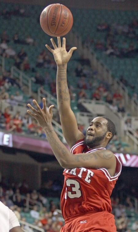 Tracy Smith knocks down a floater in the quarterfinals of the ACC Tournament Friday night. Smith had 13 points and 6 rebounds in the 58-52 win, which lands the Wolfpack in the semifinals of the tournament for the first time since 2007. Photo by Peggy Boone