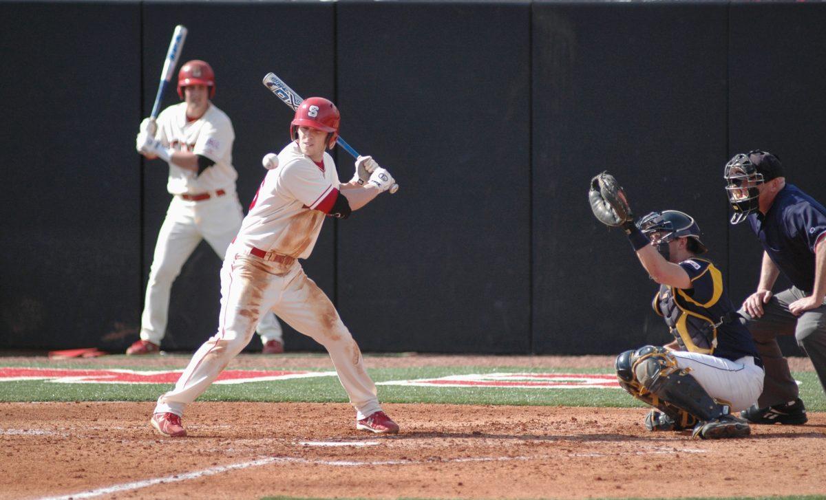 Senior Kyle Wilson takes a pitch against La Salle University Feb. 21, 2010. State won, 9-8. Photo by Jordan Moore