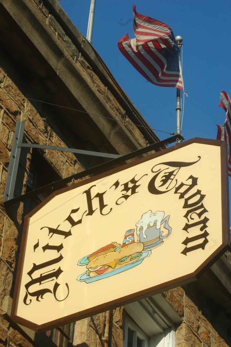 Proudly displaying American flags, Mitch's Tavern is a popular restaurant among students on Hillsborough Street. Photo by Jordan Moore