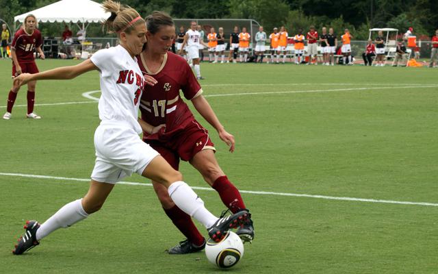 Redshirt freshman midfielder Meagan Proper wards off a Boston College defender, Alaina Beyar, during the second half of an intense match against the no. 4-ranked Eagles Sunday afternoon. In 19 minutes of play, Proper played well off the bench but her efforts came up short as the Pack lost the game 1-0. North Carolina State is now 1-1-0 in ACC conference play. Photo by Jonathan Millner.