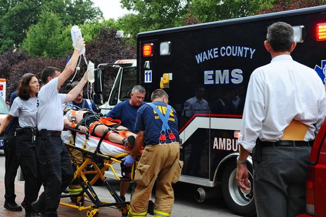 Spencer Shell, a junior in political science, is put in an ambulance following his collapse on Dan Allen Drive Sept. 2. Shell went into cardiac arrest while jogging due to an Acute Respiratory Distress Syndrome. Shell is now in stable condition at Rex Hospital.