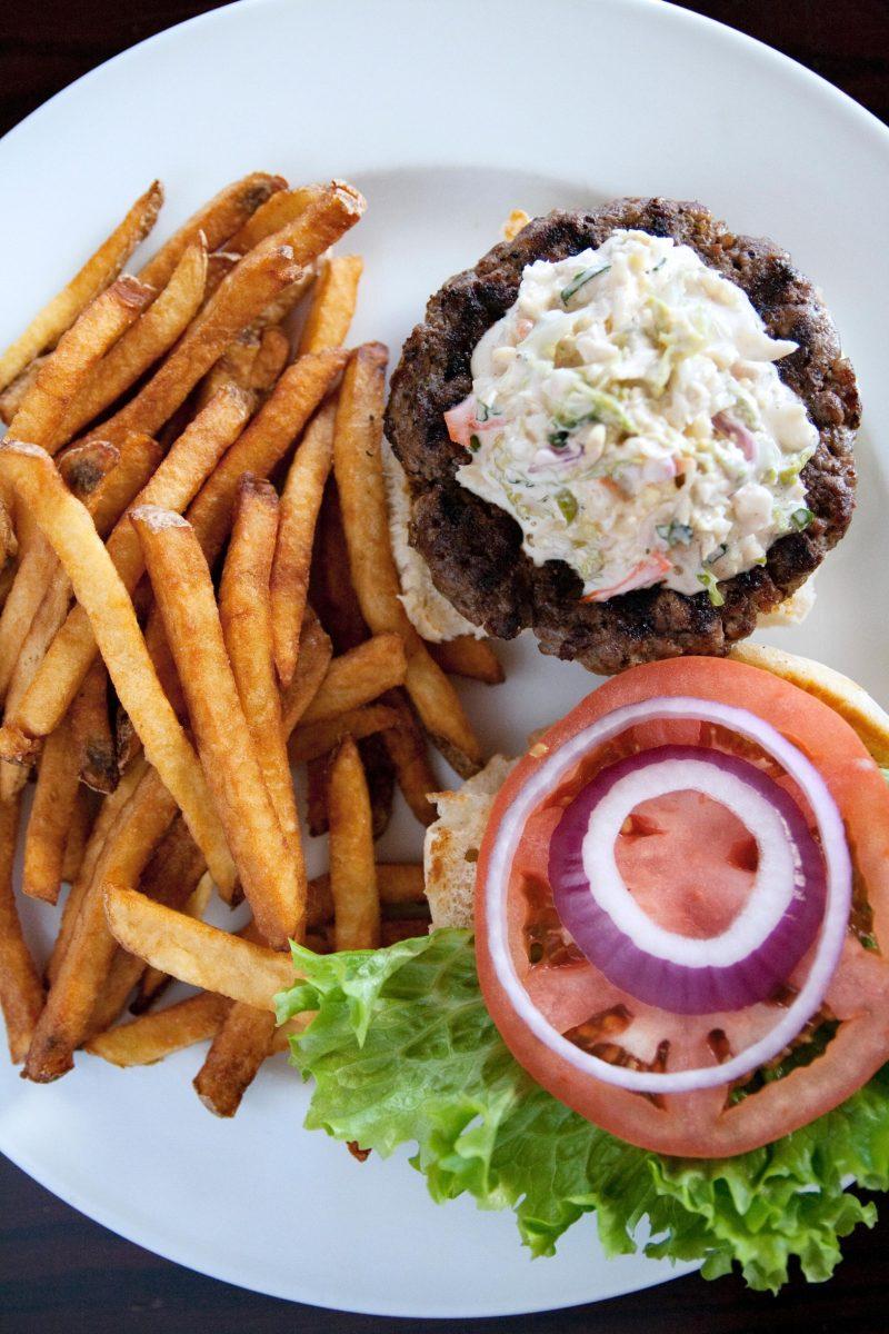 Black &amp; Blue Burger with a Cajun rub and blue cheese coleslaw at Porter's Tavern at 2412 Hillsborough Street. Photo by Natalie Ross