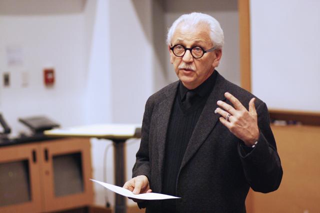 College of Design Dean Marvin Malecha speaks to students about budget cuts in Burns Auditorium on Wednesday. Malecha said that "budget cuts do not mean you stop improving." Photo by Maria White.