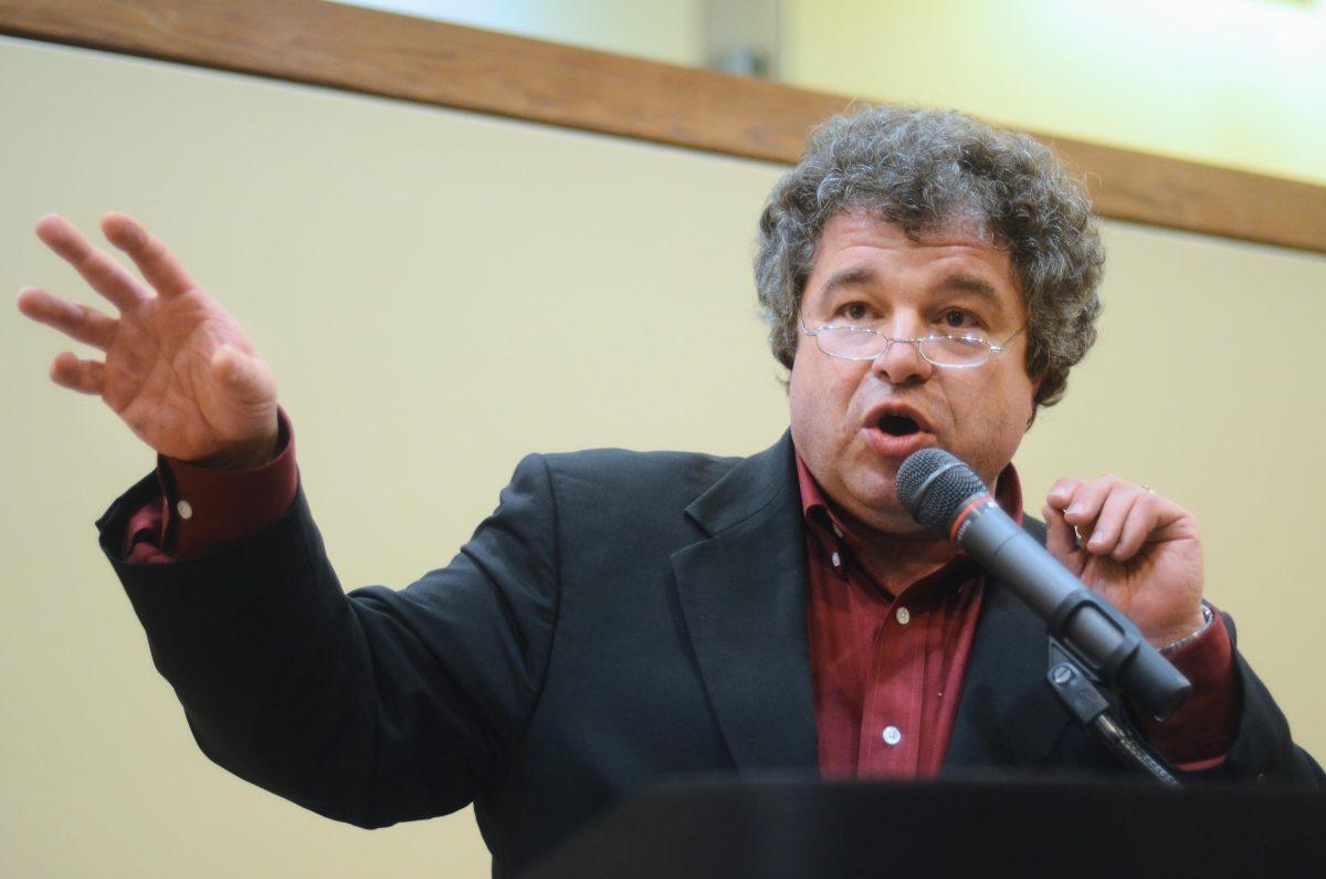 Timothy Tyson, author of "Blood Done Sign My Name" and a professor at Duke University, speaks in Caldwell Lounge Wednesday. Photo by Alex Sanchez.