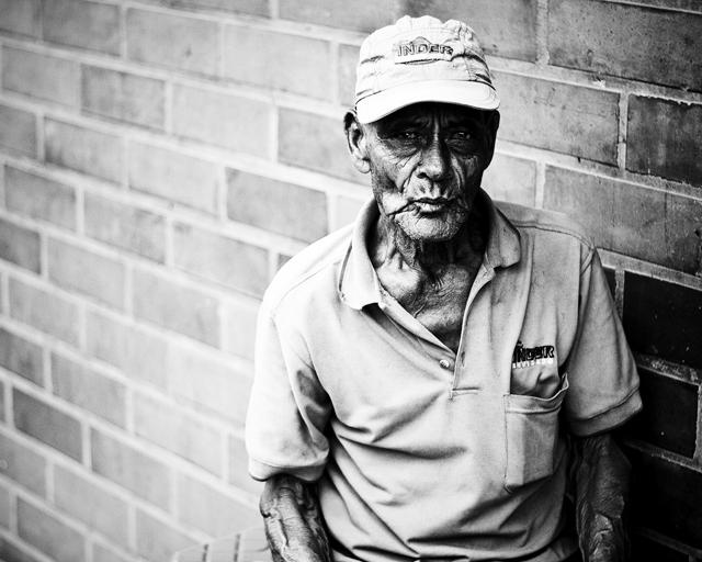 As an old man sat down in Medellin, Colombia, Austin Simmons, sophomore in graphic design, captured his image for his collection entitled "Persons of Pulchritude," which is on display at Vintage 21 Church in downtown Raleigh. Photo by Austin Simmons.