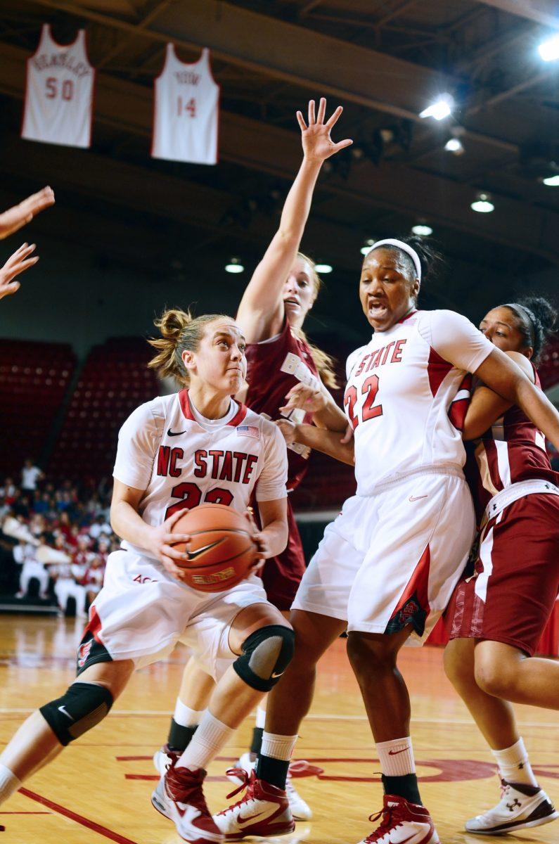 Junior Bonae Holston screens a defender, clearing a way for guard Marissa Kasanek to score. The Wolfpack won its third straight game on Senior Night, beating the Eagles 80-69.