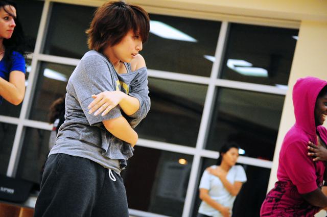 Cindy Lam, a freshman in chemical engineering, practices a dance routine as the team prepares for upcoming dance events. "Fusion is more than just a dance crew, we are a family. There's no love like our Fusion love," Lam said. Photo by Jonathan Millner
