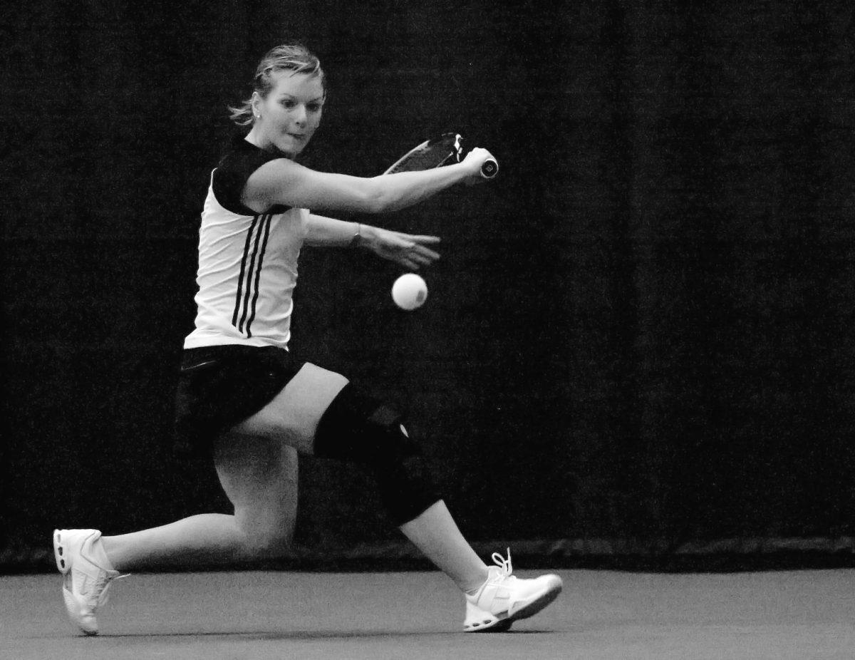 Lenka Hojckova stretches for a ball in the Wolfpack's match against Charleston Southern.