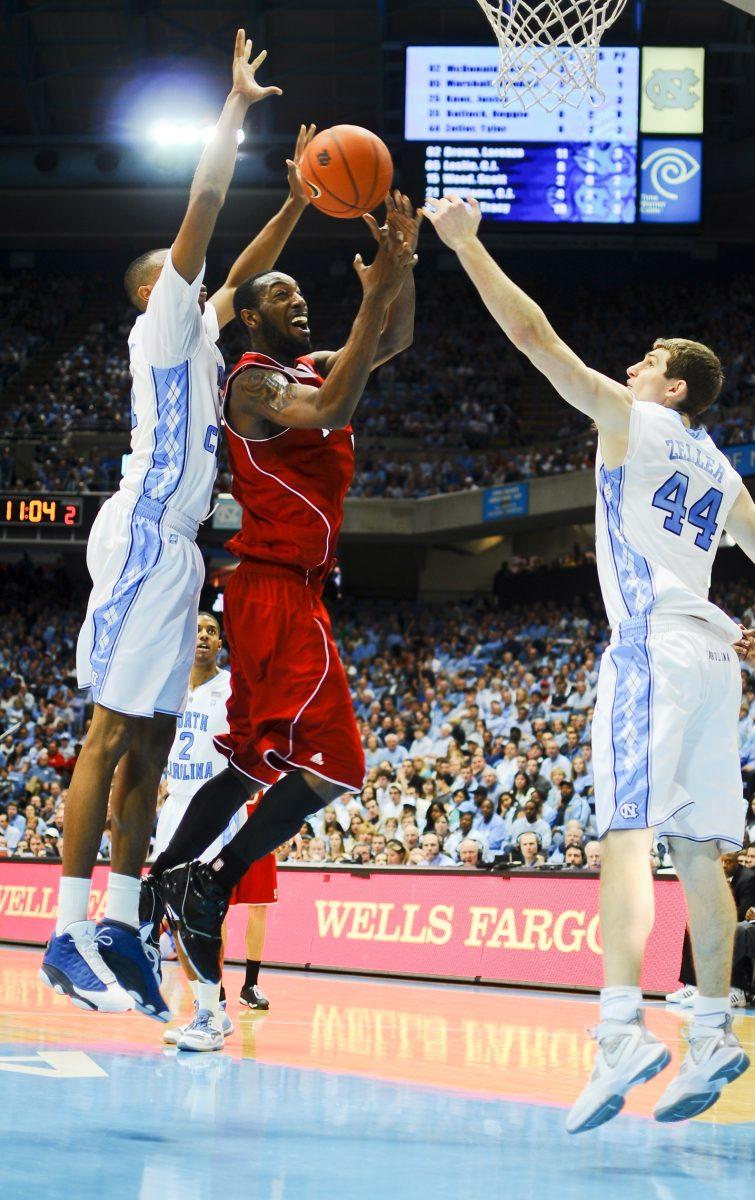 C.J. Leslie attempts a shot in the paint between North Carolina's John Henson and Tyler Zeller on Jan. 29 in the Smith Center. Leslie has had a recent string of productive outings, putting his name into the ACC Rookie of the Year discussion.