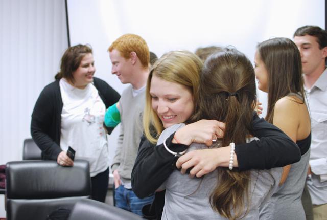 Chandler Thompson, a senior in economics, celebrates her preliminary win in the Student Body President election Tuesday night. Photo by Sarah Tudor.