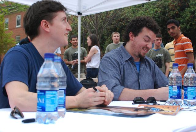 Danny McBride and director David Green sit outside the Wolf Plaza signing posters and taking pictures with students on March 22, 2011 promoting their new movie Your Highness. McBride and Green were on campus later that evening for a Q&amp;A with the audience after the preview screening. Photo by Sarah Tudor.
