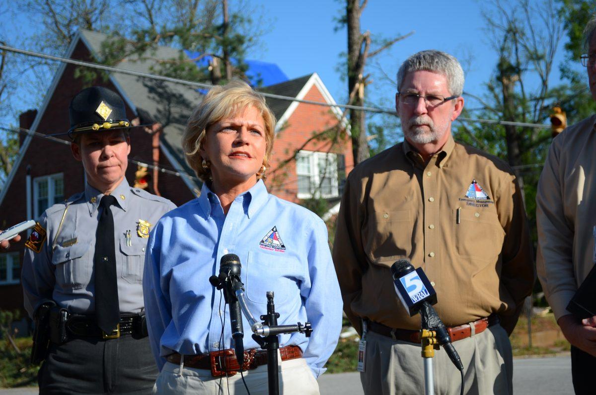 Governor Bev Perdue addresses the media at the corner of Cabarrus Street and Bloodworth Street in downtown Raleigh April 17, 2011. Perdue said she had been in contact with President Barack Obama after a tornado damaged the area April 16. Photo by Alex Sanchez
