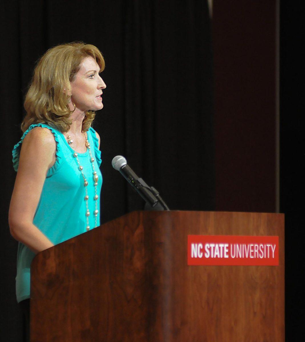 Former women's basketball player Deborah Antonelli speaks to the student athletes at the 2011 Welcome Back Pack dinner. Photo by Alex Nitt.