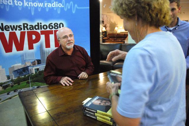 Dave Ramsey, famous radio personality, speaks with fans at his book signing held Tuesday in Raleigh. Ramsey spoke in Raleigh about business strategies and mistakes he has made as a business man in the past.