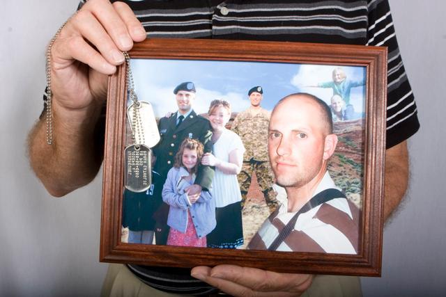 Dennis and Karen VanDreumel lost their son Army Spc. Joseph VanDreumel, 32 of Grand Rapids, Mich., in Aug. 14 in Pakika province, Afghanistan. VanDreumel specialized in vehicle recovery operations and was assigned to 1st Battalion, 2nd Infantry Regiment, 172nd Infantry Brigade at Grafenwoehr, Germany. Karen VanDreumel is a writing programs assistant with the English department. Photo by Dreier Carr