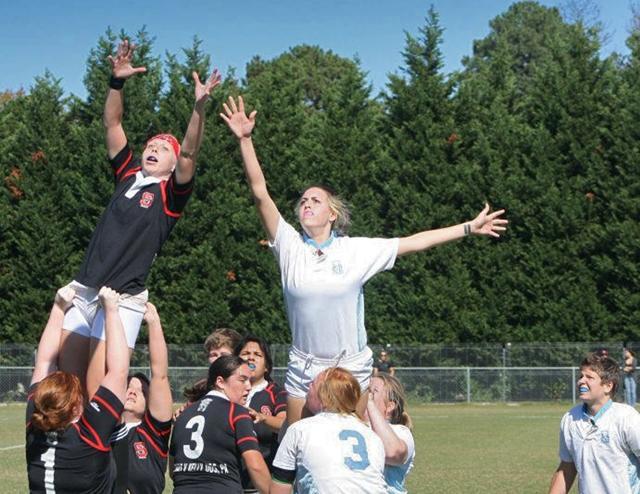 Sophomore in horticulture and NCSU Women&#8217;s Rugby Football Club&#8217;s flanker Caitlin Davis is put up for an offensive line out during Saturday&#8217;s competition against UNC-Chapel Hill. N.C. State went on to win the match 65-10. Contributed by N.C. State Women's Rugby Football Club.