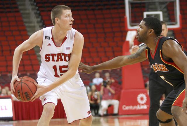 Wolfpack forward Scott Wood looks for a pass during the N.C. State basketball exhibition game. The Wolfpack defeated Flagler College 102-61. Wood lead the game with 24 points. Photo by Patrick Easters