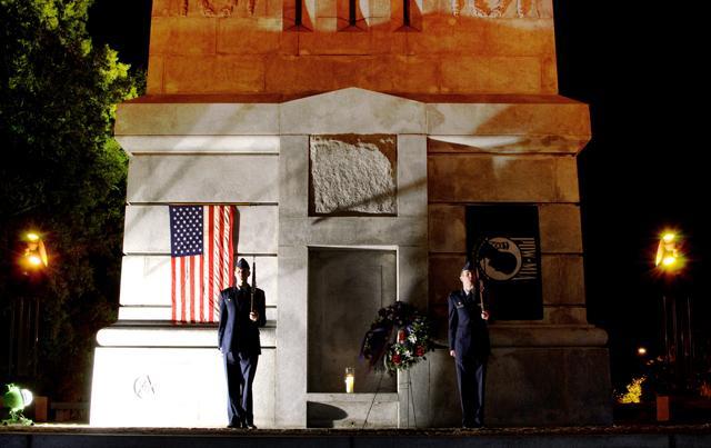 Sophomore in computer engineering Mikey Ledford and sophomore in German studies Kyle Backhus stand guard in front of the Memorial Bell Tower late at night on Thursday, Nov. 10, 2011. The annual vigil is held in memory of those who have served, starting at 8 p.m. and running over night until the morning of Veteran's Day. Photo by John Joyner.