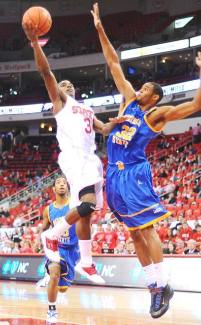 Senior guard Alex Johnson puts up a shot in the lane against Morehead State at the RBC Center Sunday, Nov. 13, 2011. Johnson had six points and five assists in the 91-61 Wolfpack win.