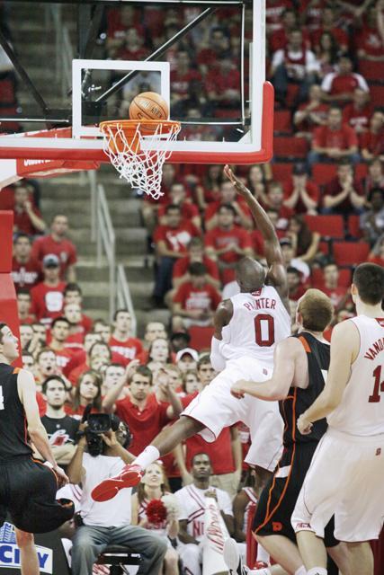 DeShawn Painter, junior center, makes a fade-away lay-up in a close game vs. Princeton on Wednesday, Nov. 16 in the RBC Center. Photo by Callie Martin.