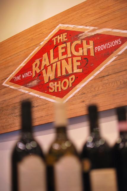 The Raleigh Wine Shop on Glenwood Avenue gives guests a honest way of choosing wines with owners, Seth Hoffman, Jeff Bramwell, and Ryan Fulkerson who handle everything in store. Photo by Ben Tran